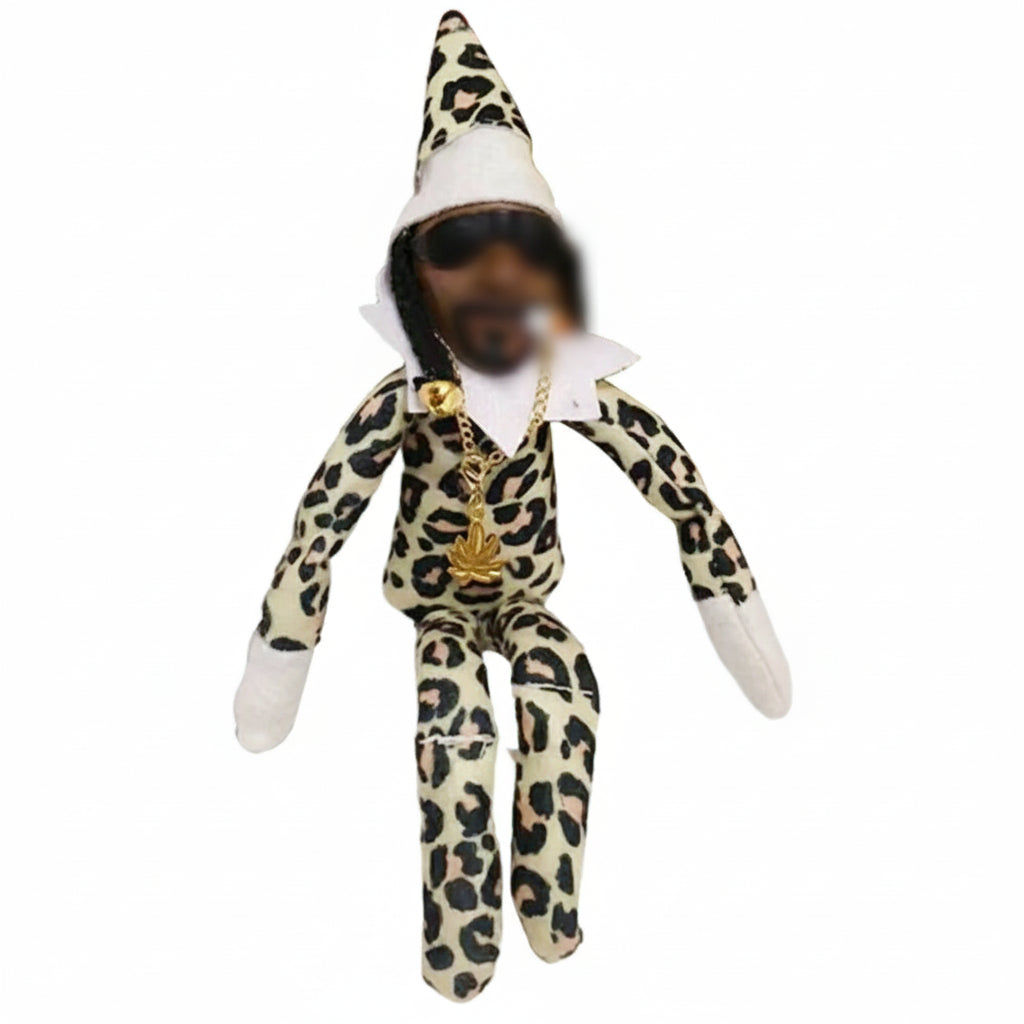 Elf doll with leopard print outfit and gold accessories on a white background