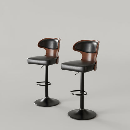 Two black bar stools with brown seats in a modern kitchen setting.