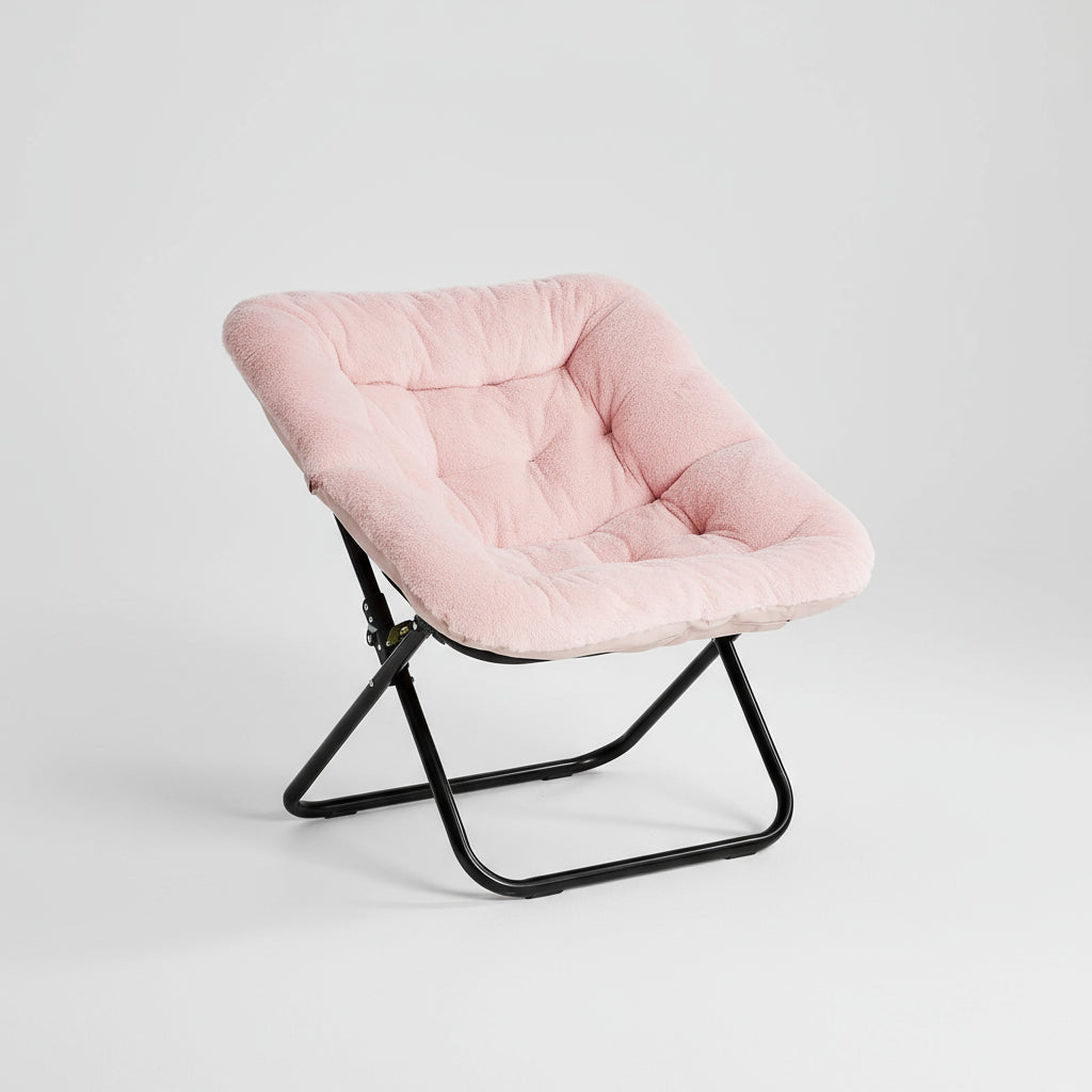 Pink plush folding chair on a white background