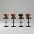 Four wooden bar stools with black metal legs in a modern kitchen setting.