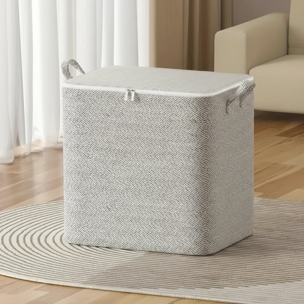 Gray laundry basket with dimensions on a wooden floor in a living room setting