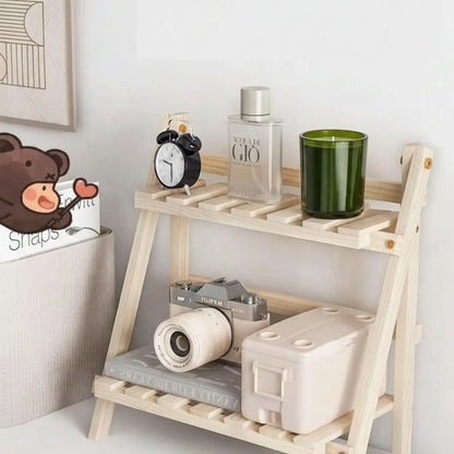 Wooden storage rack with various items on a white background