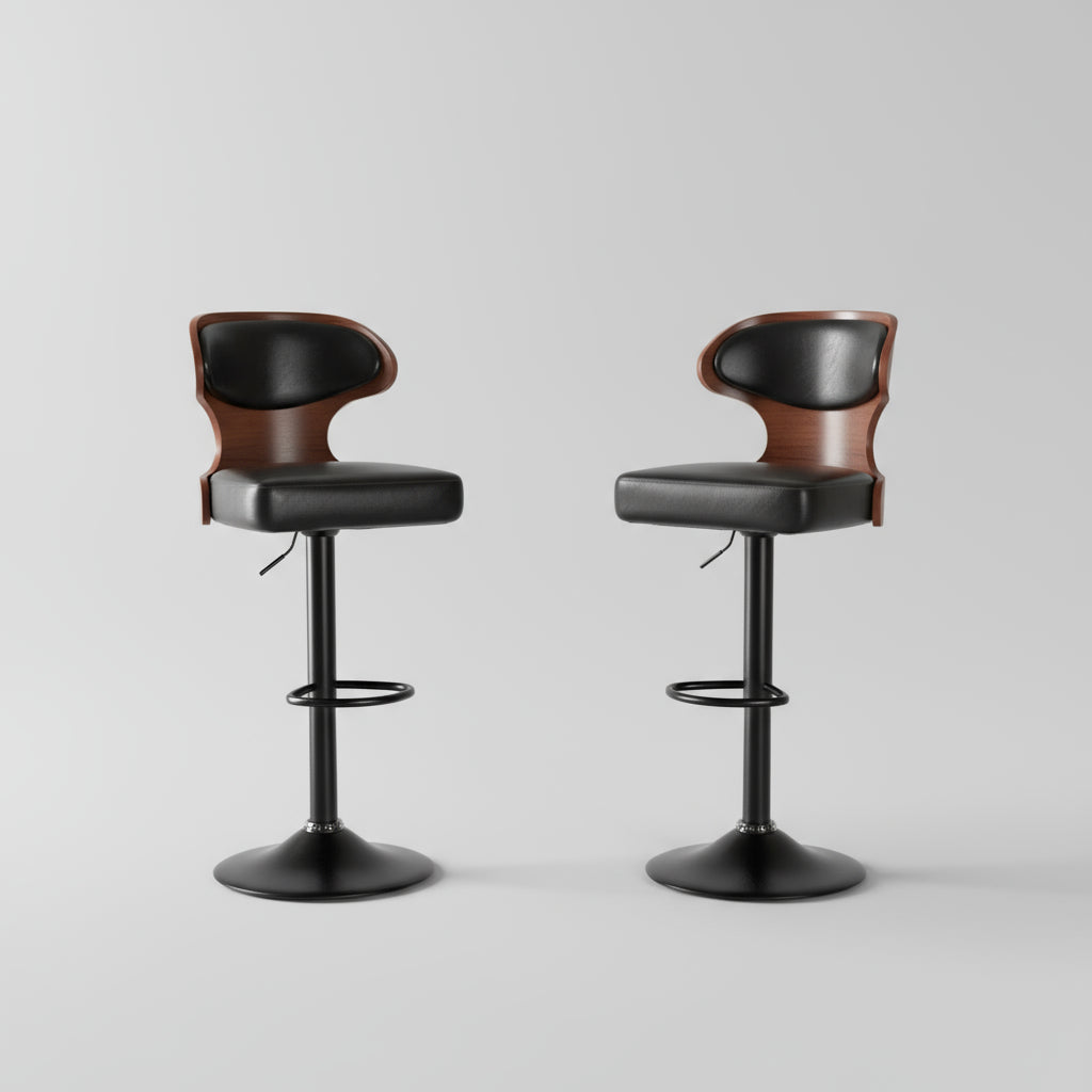 Two black bar stools with wooden seats in a kitchen setting.