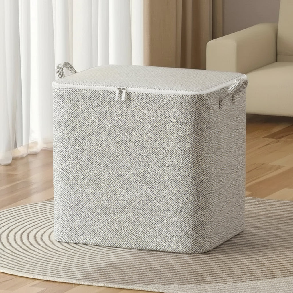 Gray laundry basket with measurements on a wooden floor